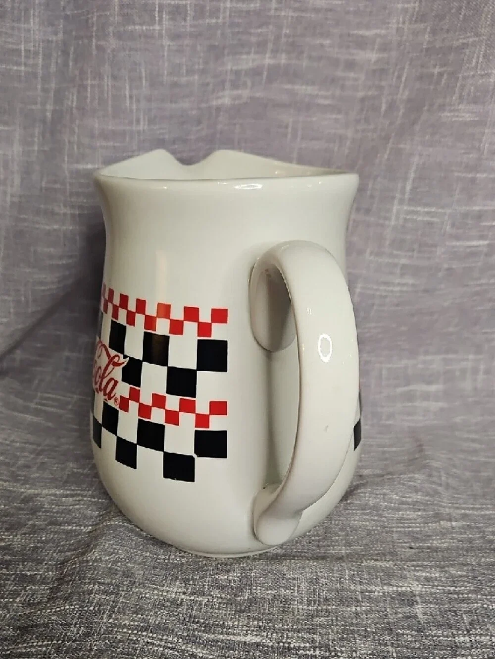 Coca-Cola White Ceramic Pitcher with Red Logo and Black Checkerboard
